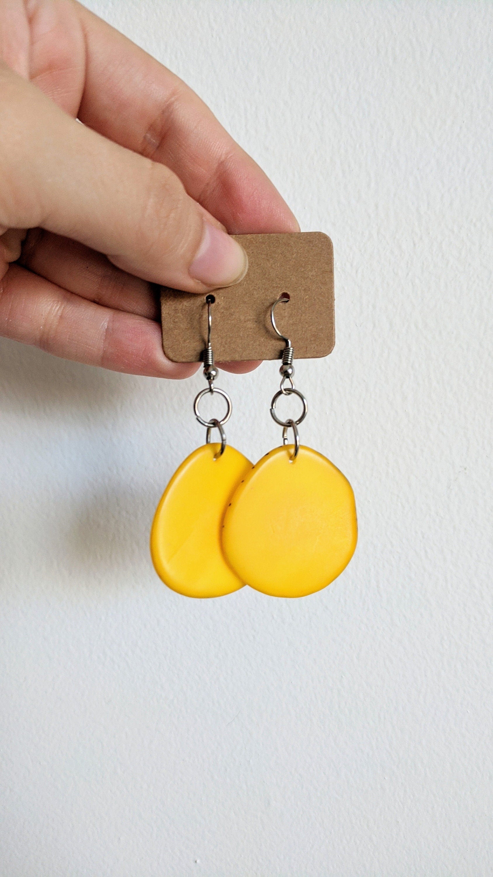 Folk style yellow earrings.