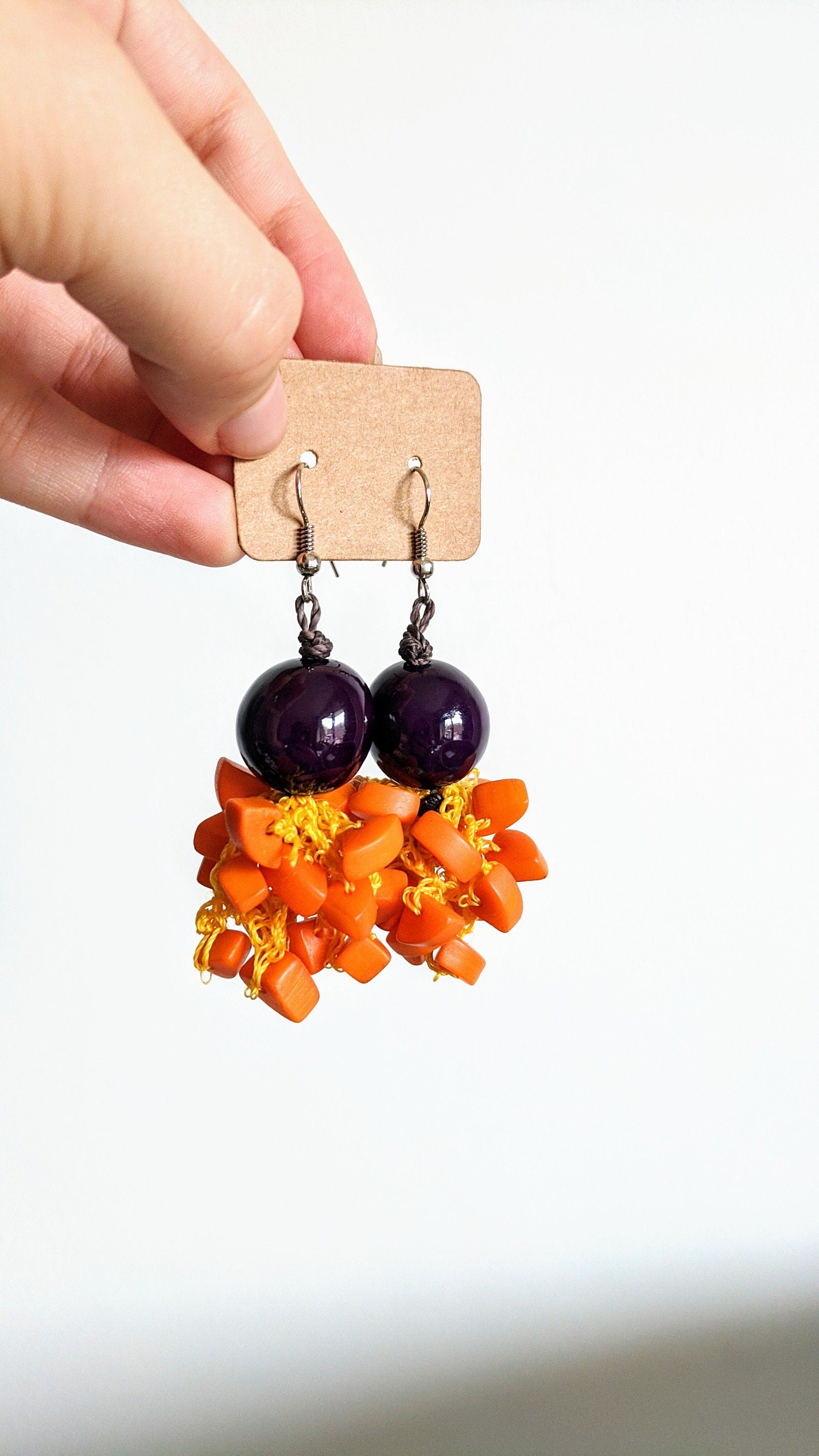 Orange and purple earrings.