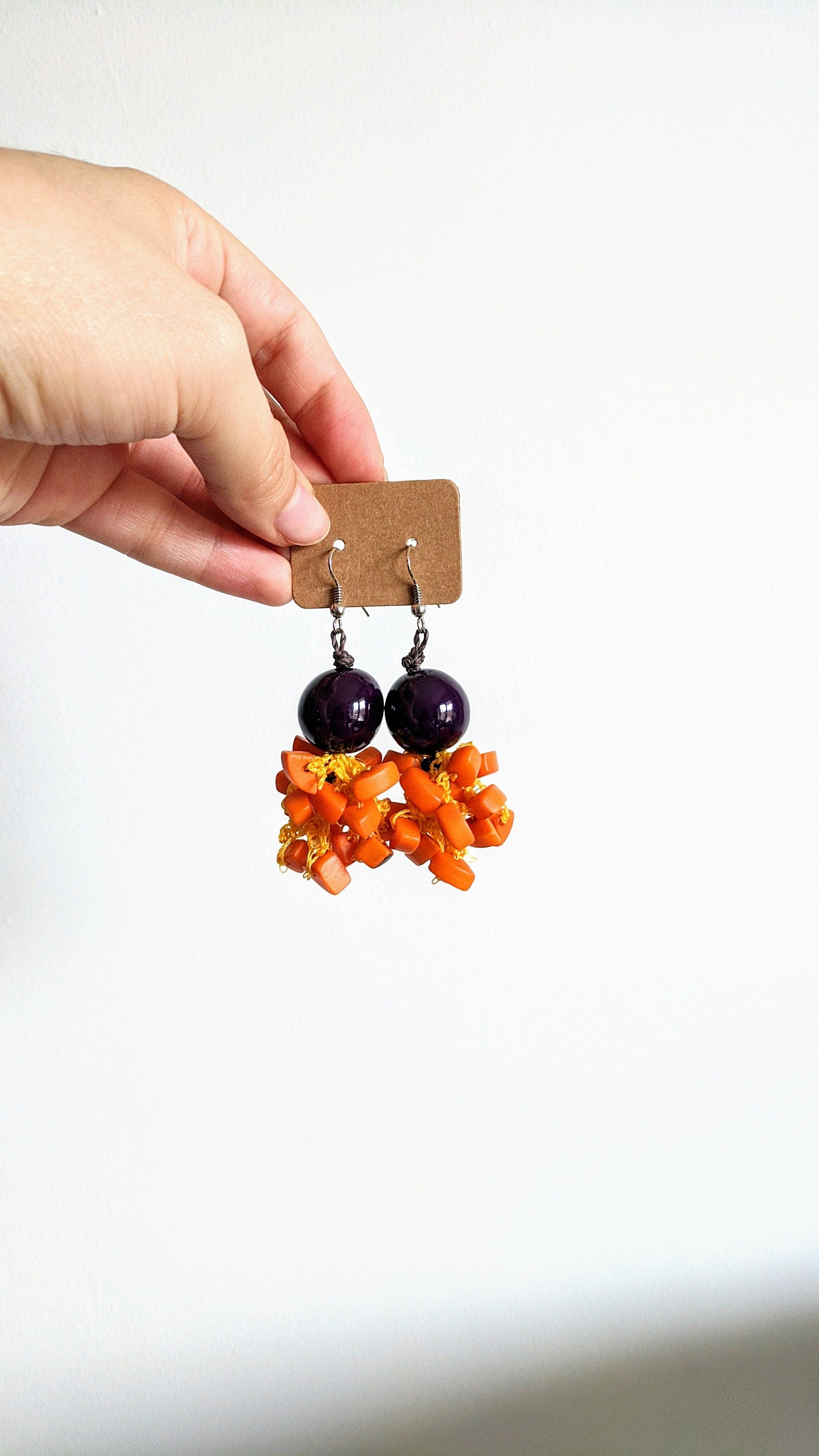 Orange and purple earrings.