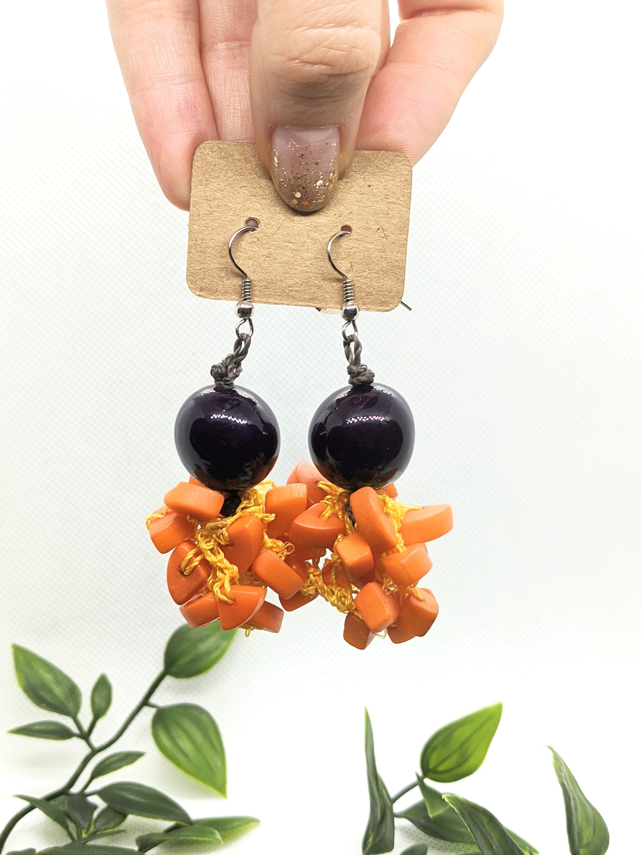 Orange and purple earrings.