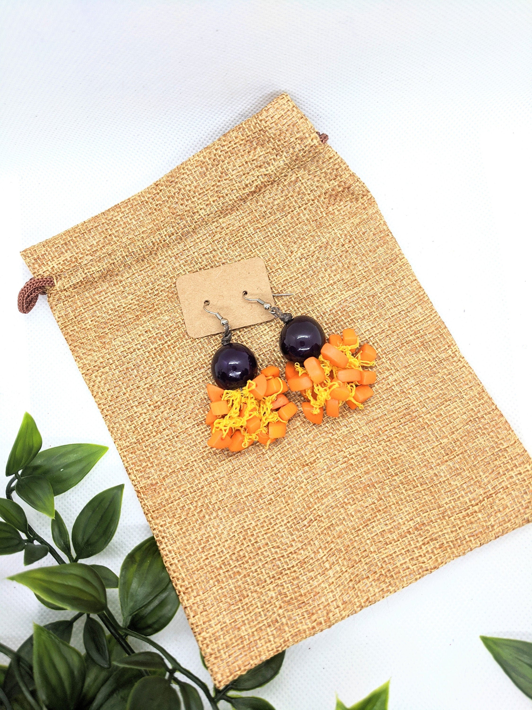 Orange and purple earrings.