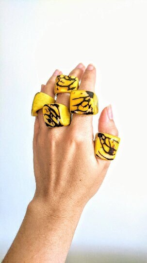 Yellow cocktail ring.