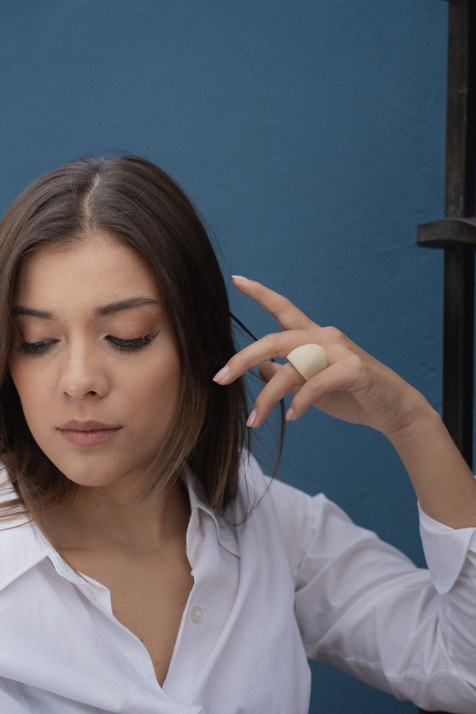 Large statement matte white ring.