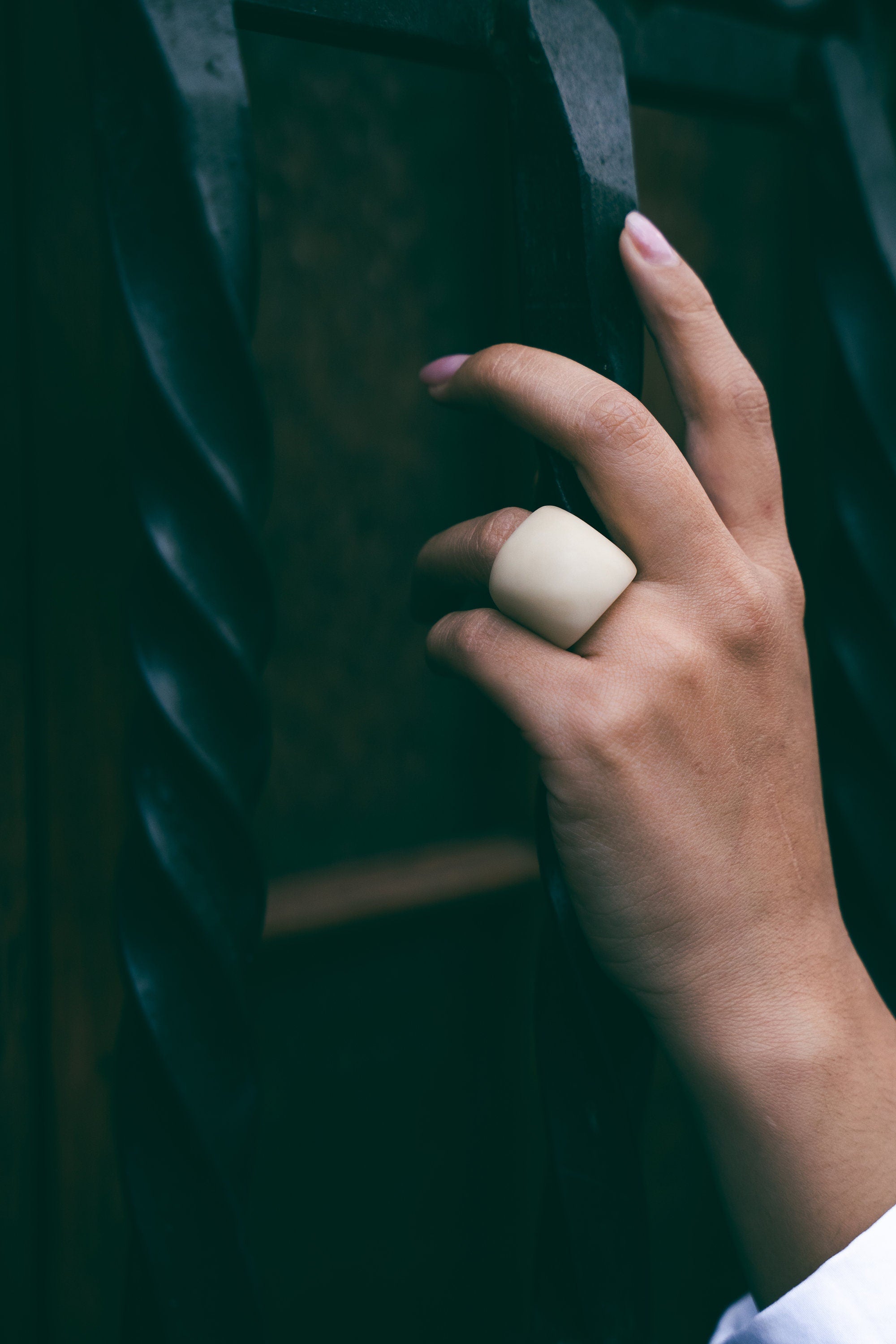 Large statement matte white ring.