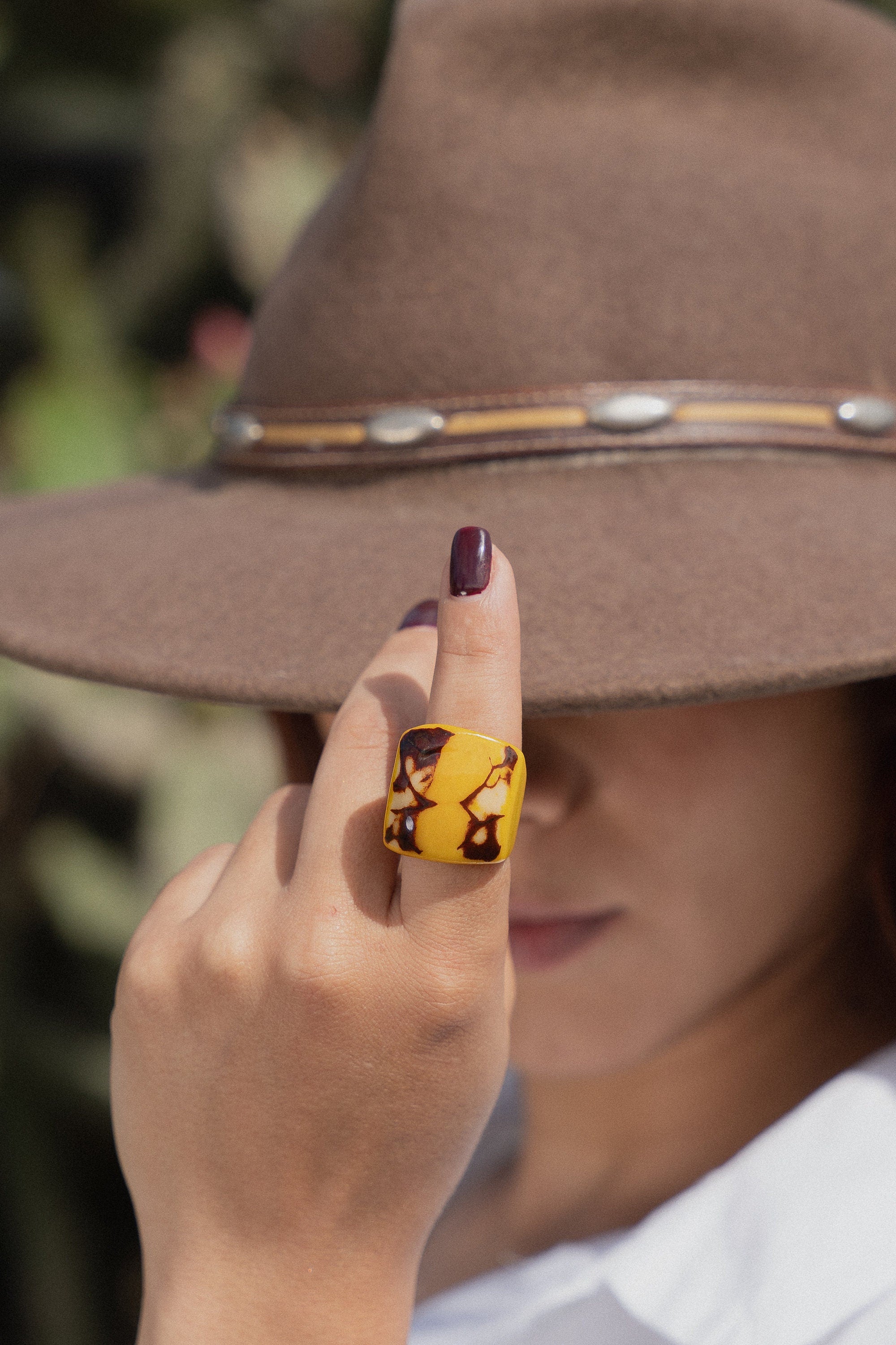 Yellow cocktail ring.