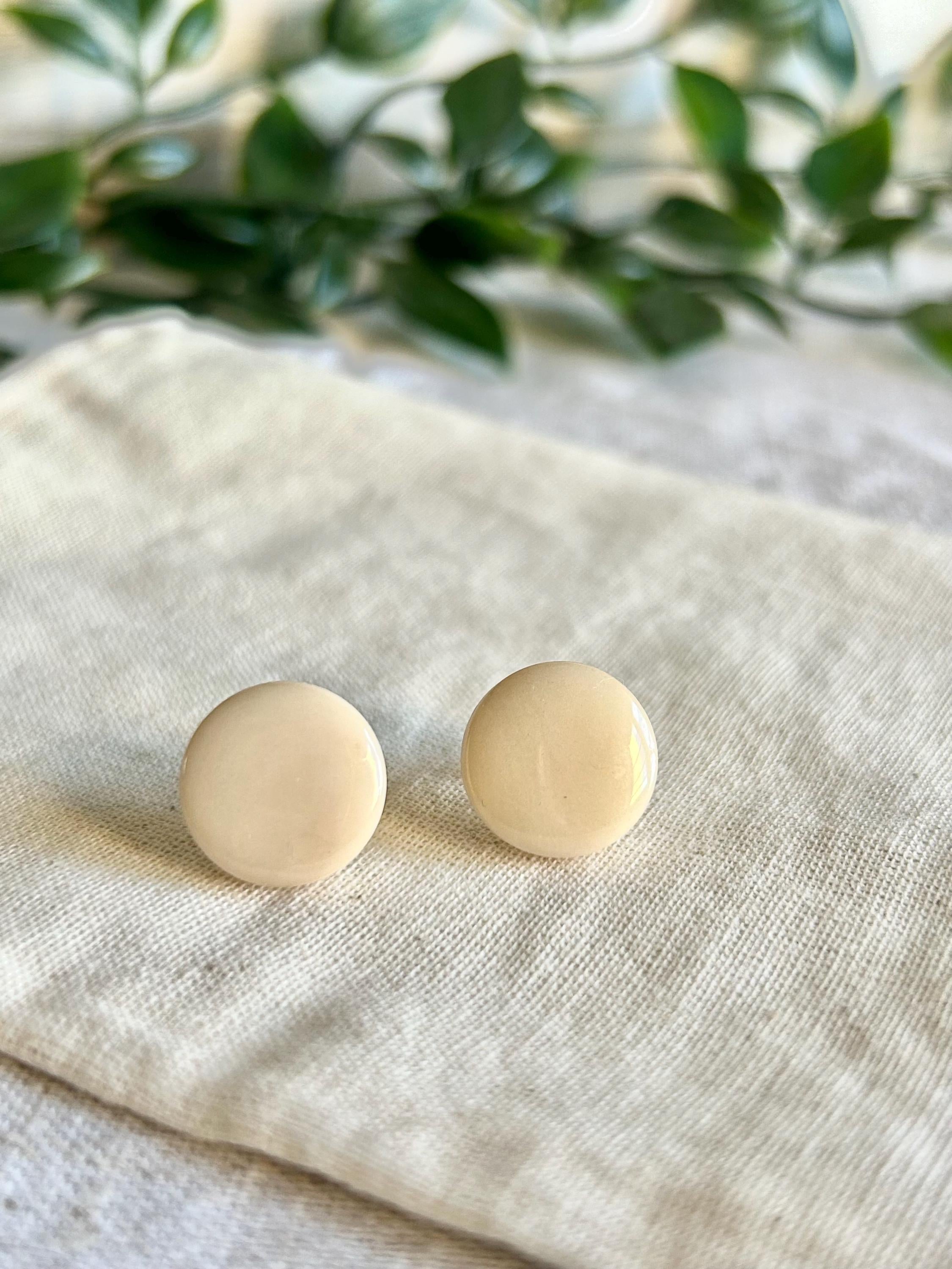 White Small Stud Earrings with plastic backs.