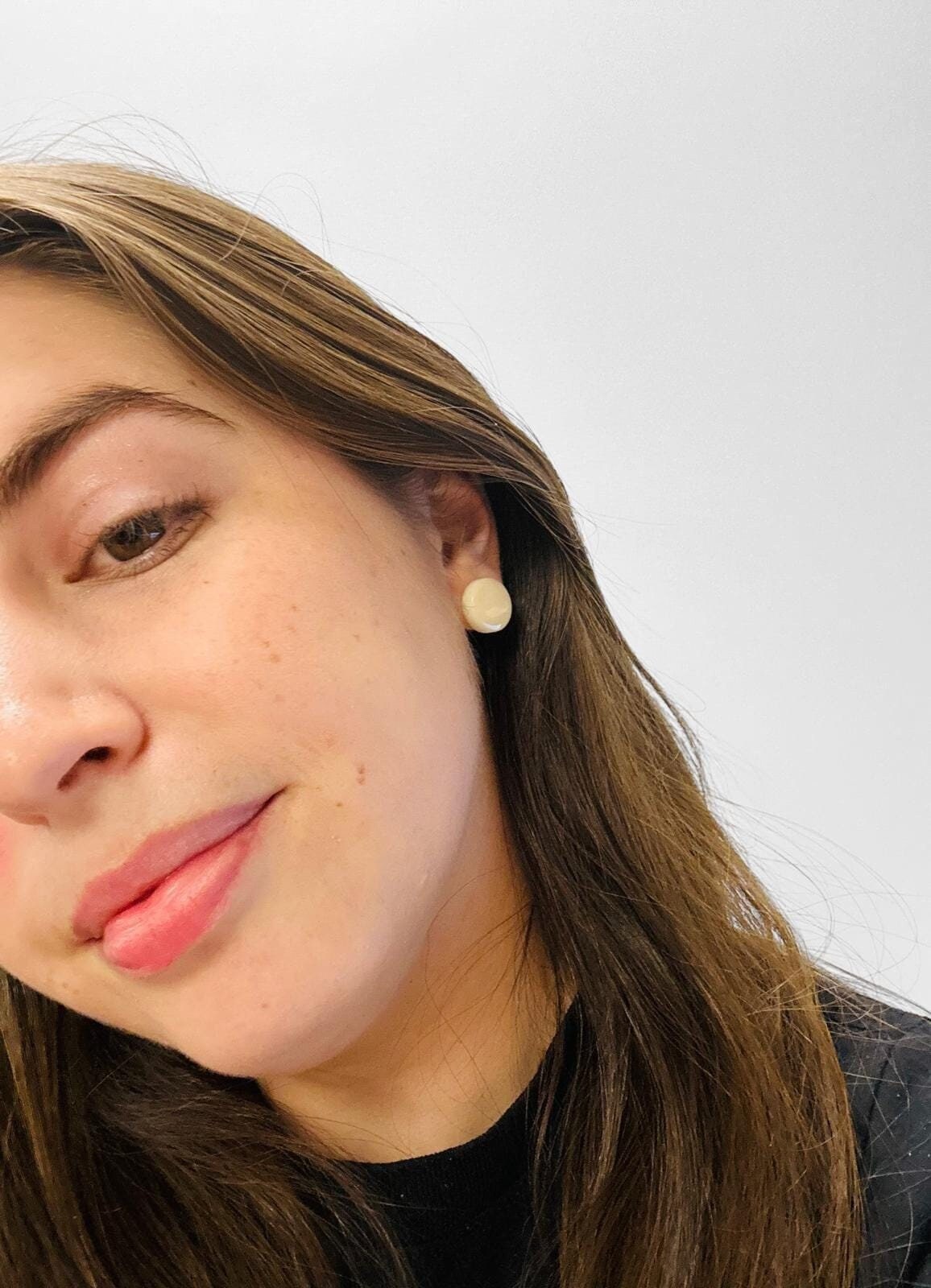 White Small Stud Earrings with plastic backs.