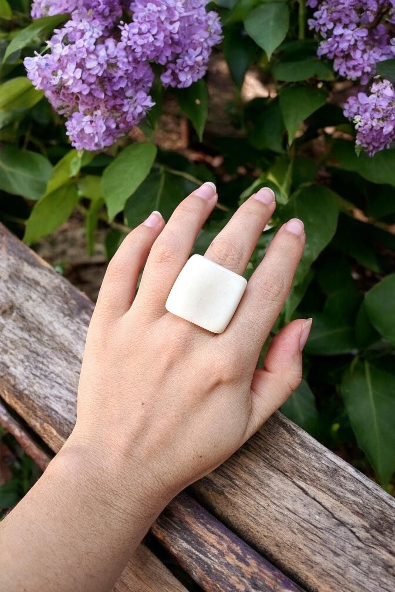 Large statement matte white ring.