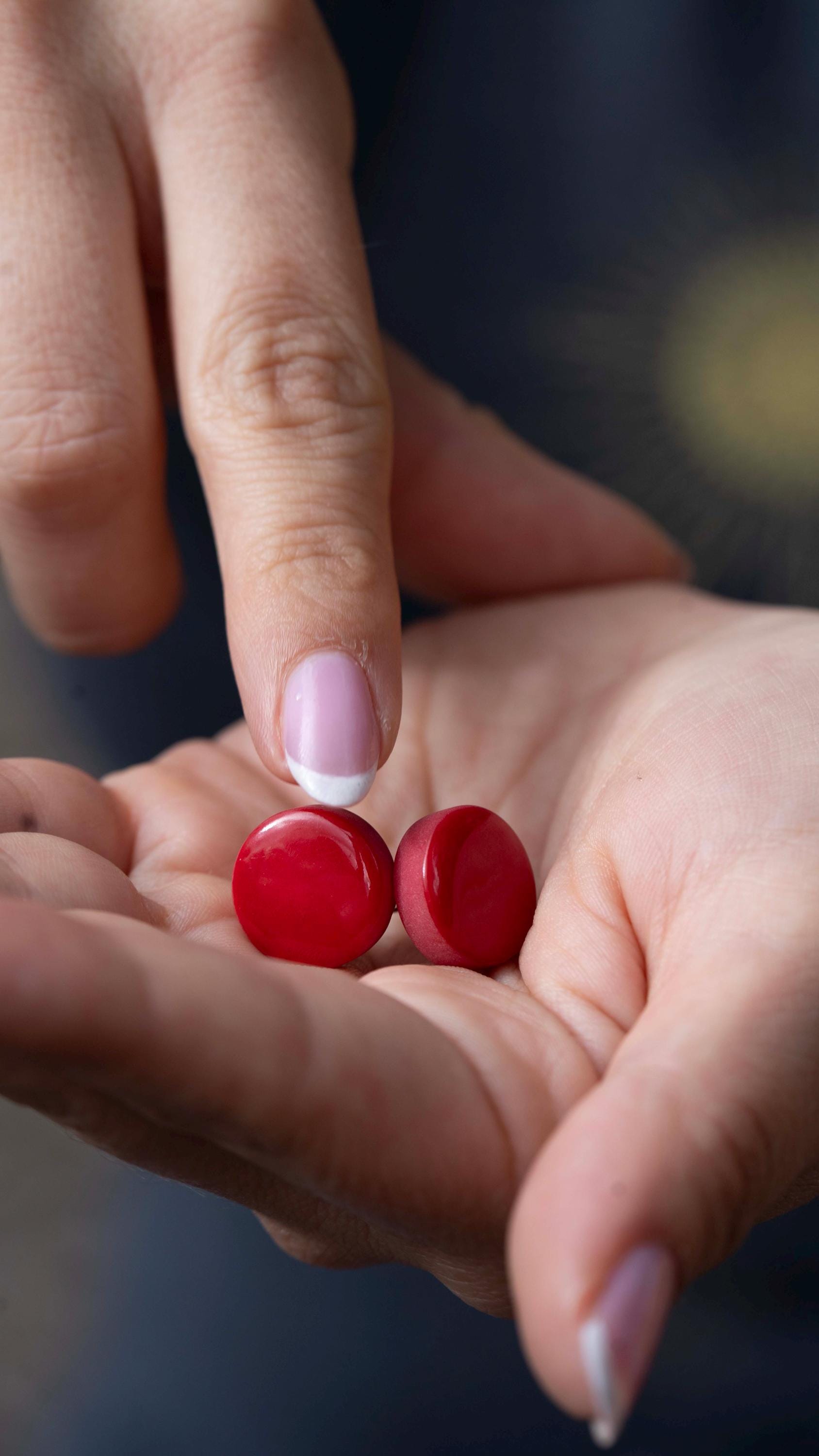 Red Tagua Nut Stud Earrings.