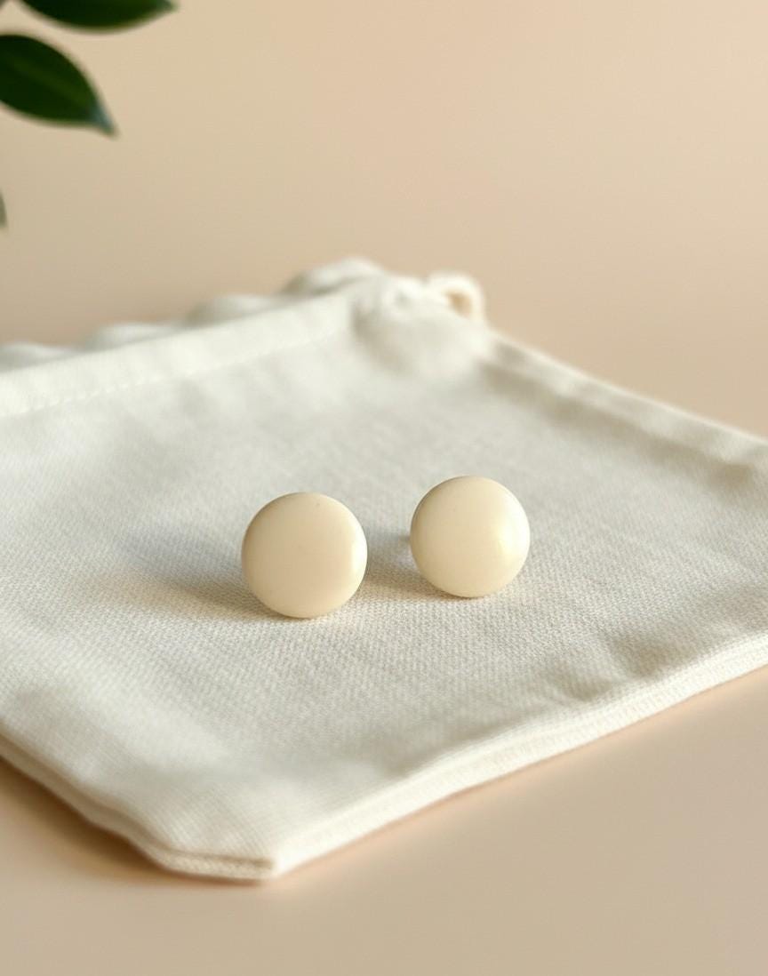 White Small Stud Earrings with plastic backs.