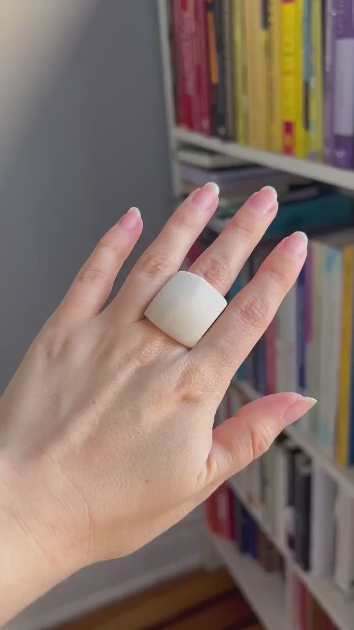 Large statement matte white ring.